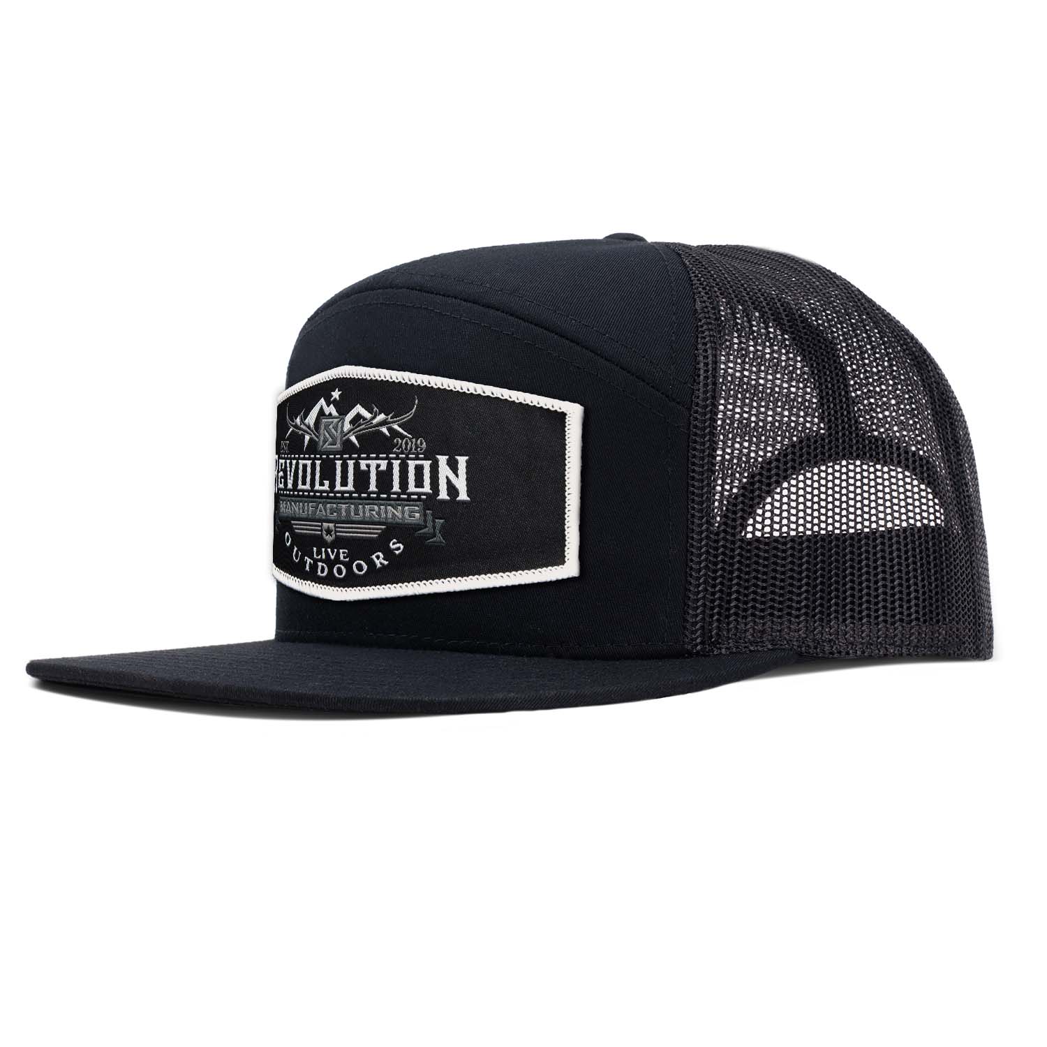All black 7 panel flat bill trucker hat with Revolution Mfg Live Outdoors woven black patch with white border