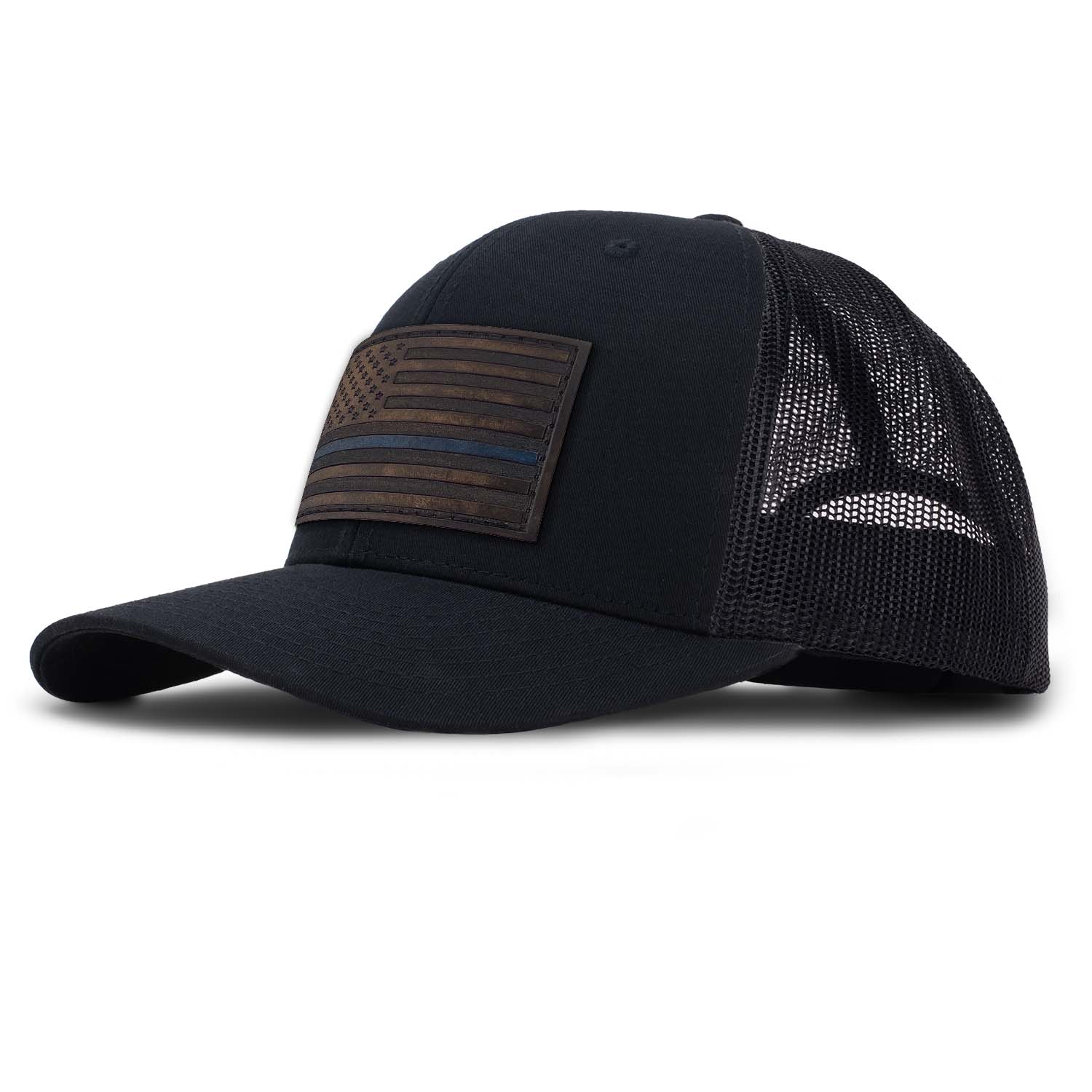 Revolution Mfg Thin Blue Line full grain leather American flag patch on a classic black trucker hat with black mesh
