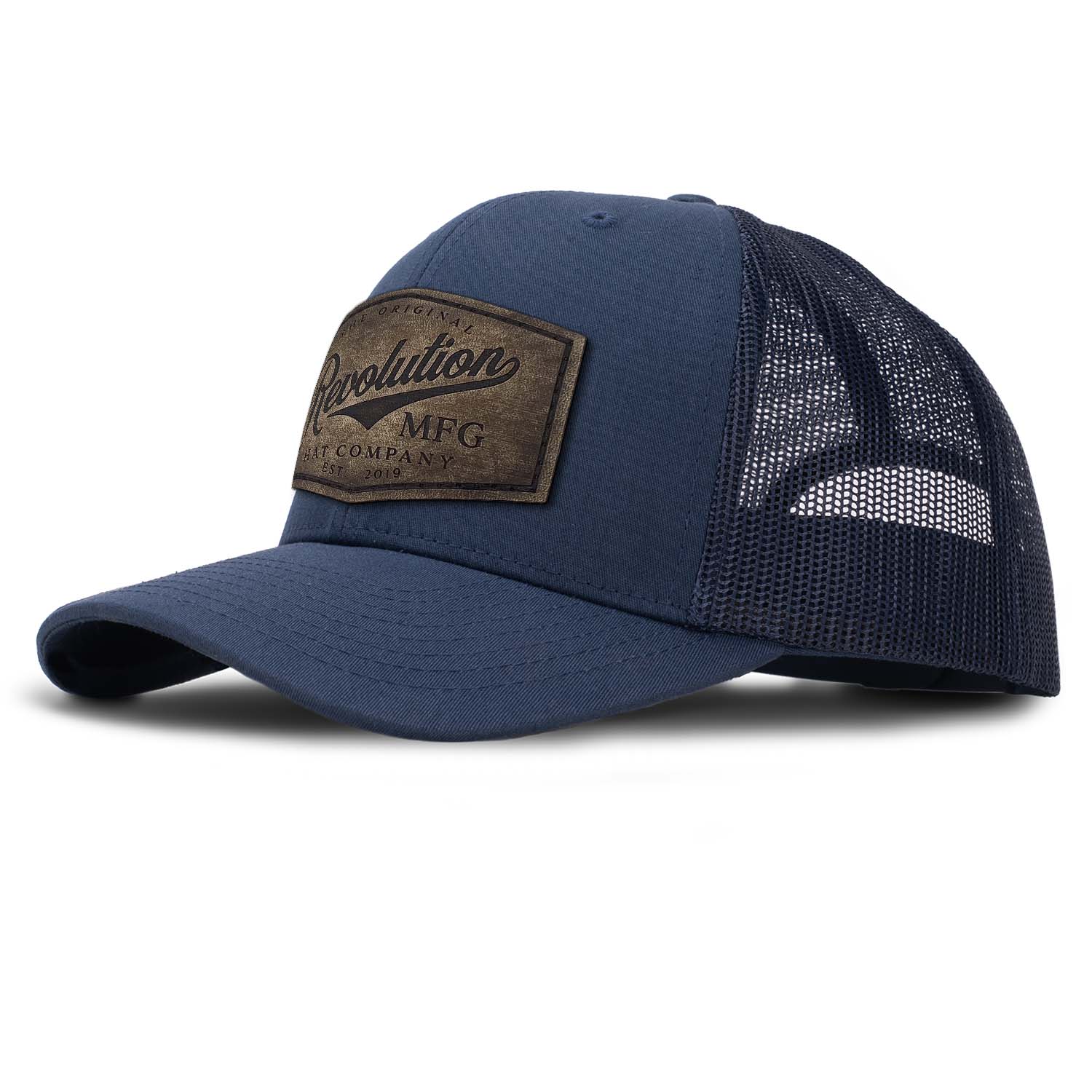 Revolution Hat Co full grain leather patch in a vintage finish on a navy with navy mesh classic trucker hat