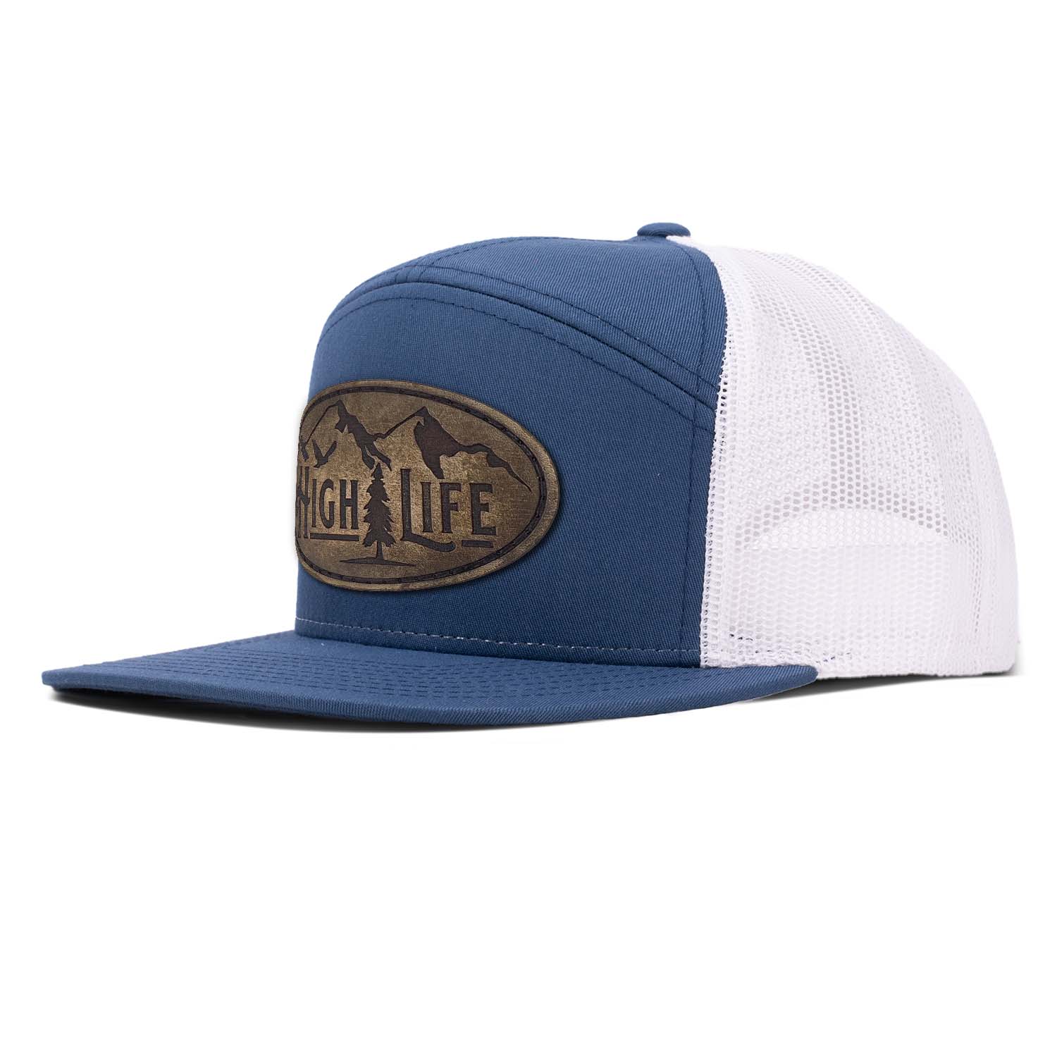 Revolution Mfg navy 7 panel trucker hat with white mesh featuring our full grain leather vintage finish High Life patch stitched on the seamless front panel