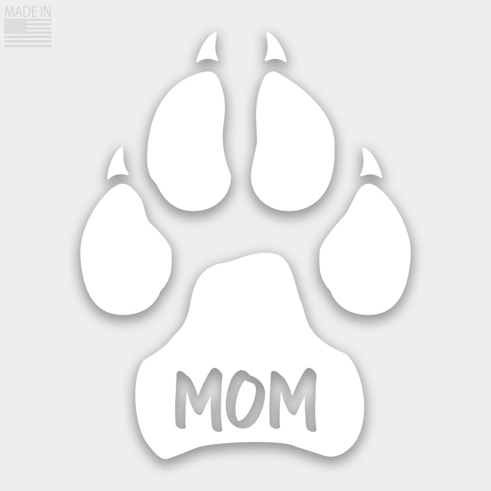 Die cut white dog paw with the word "mom" cut out decal made in USA from durable outdoor grade vinyl that is waterproof and weatherproof