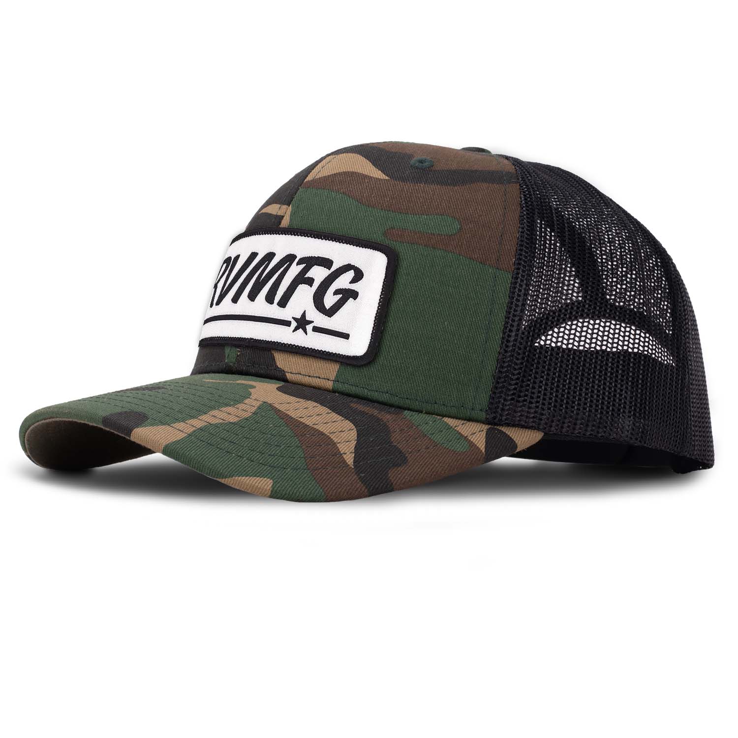 Revolution Mfg classic trucker hat in woodland camo with black mesh with a white woven RVMFG patch with black letters and a black border
