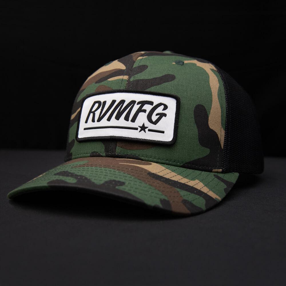 Woodland Camo and Black classic trucker patch hat shown with white background woven RVMFG patch