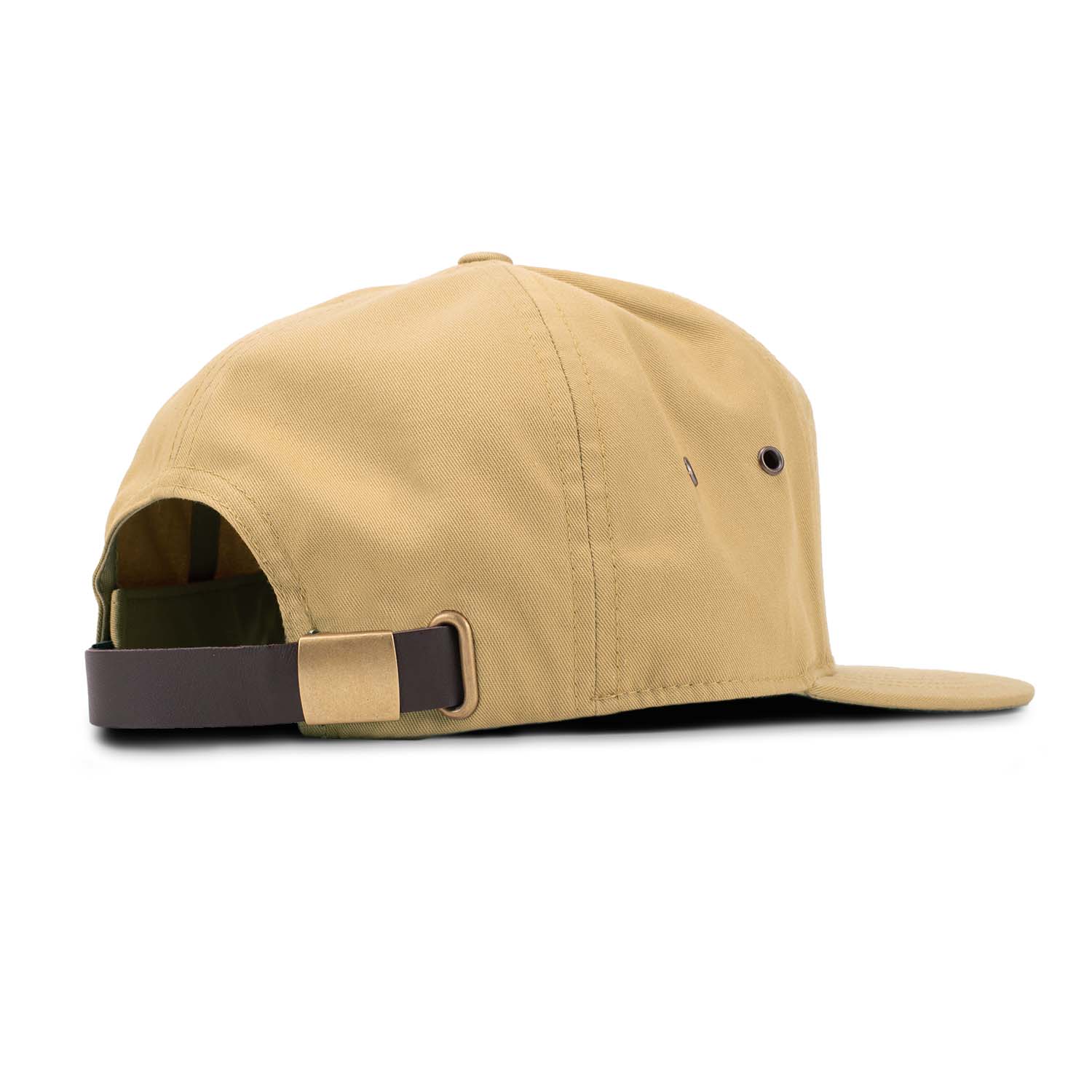 Back view of the biscuit tan 7 panel style hat showing the adjustable leather strapback with brass clasp closure and brass eyelets
