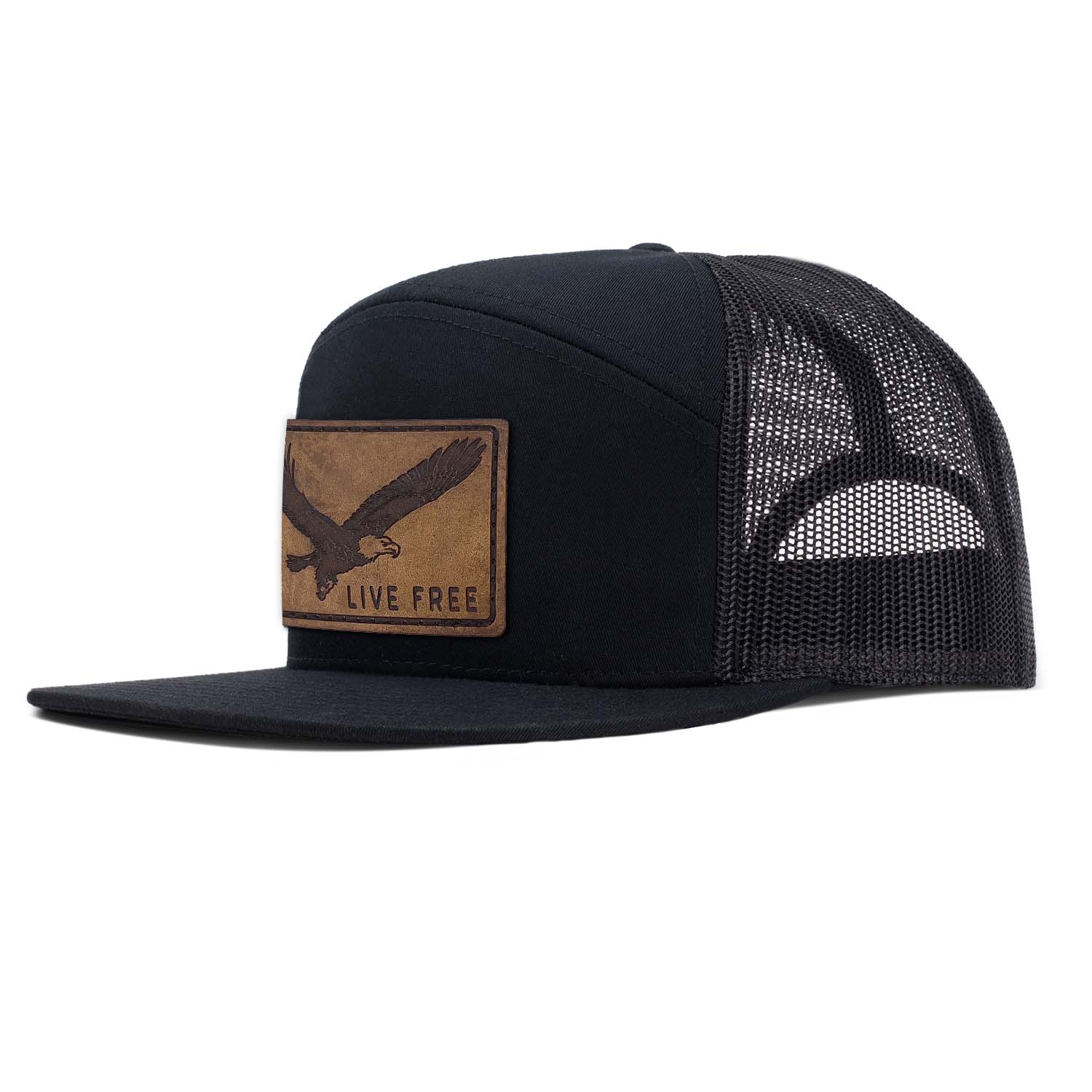 Revolution Mfg black with black mesh 7 panel trucker featuring our full grain leather antique finish Live Free patch on the seamless front panel.