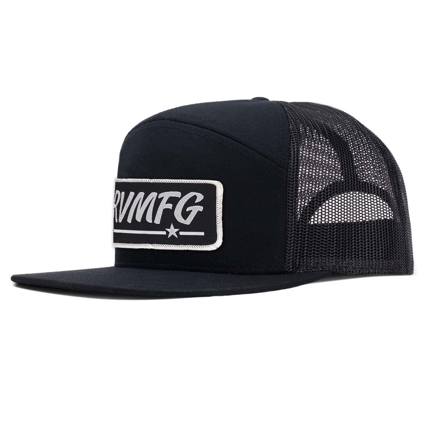 Revolution Mfg all black 7 panel flat bill with black RVMFG woven patch with white letters and white border