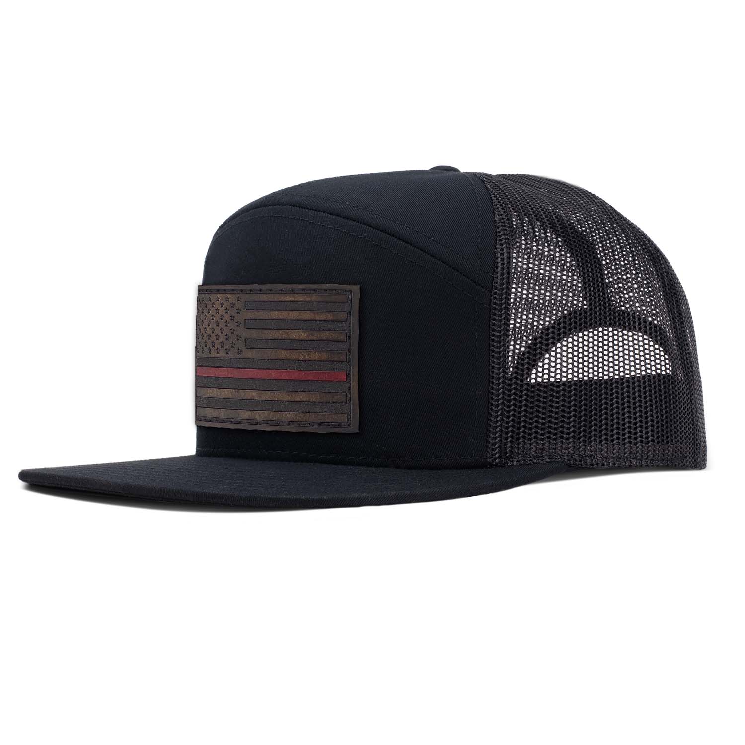 Revolution Mfg all black 7 panel trucker featuring a full grain leather American Flag Thin Red Line patch