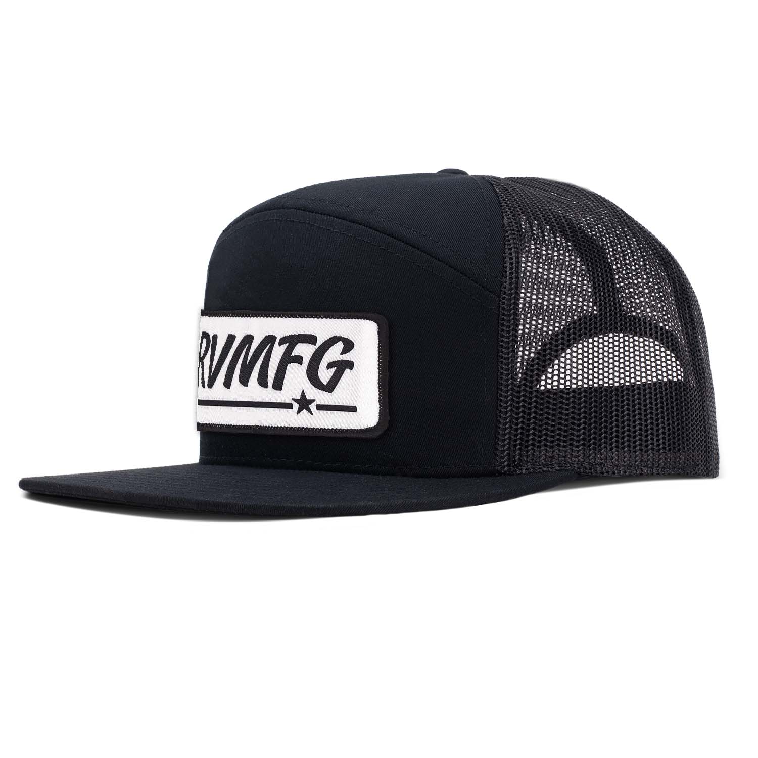 Revolution Mfg all black 7 panel flat bill with white RVMFG woven patch with black letters and black border