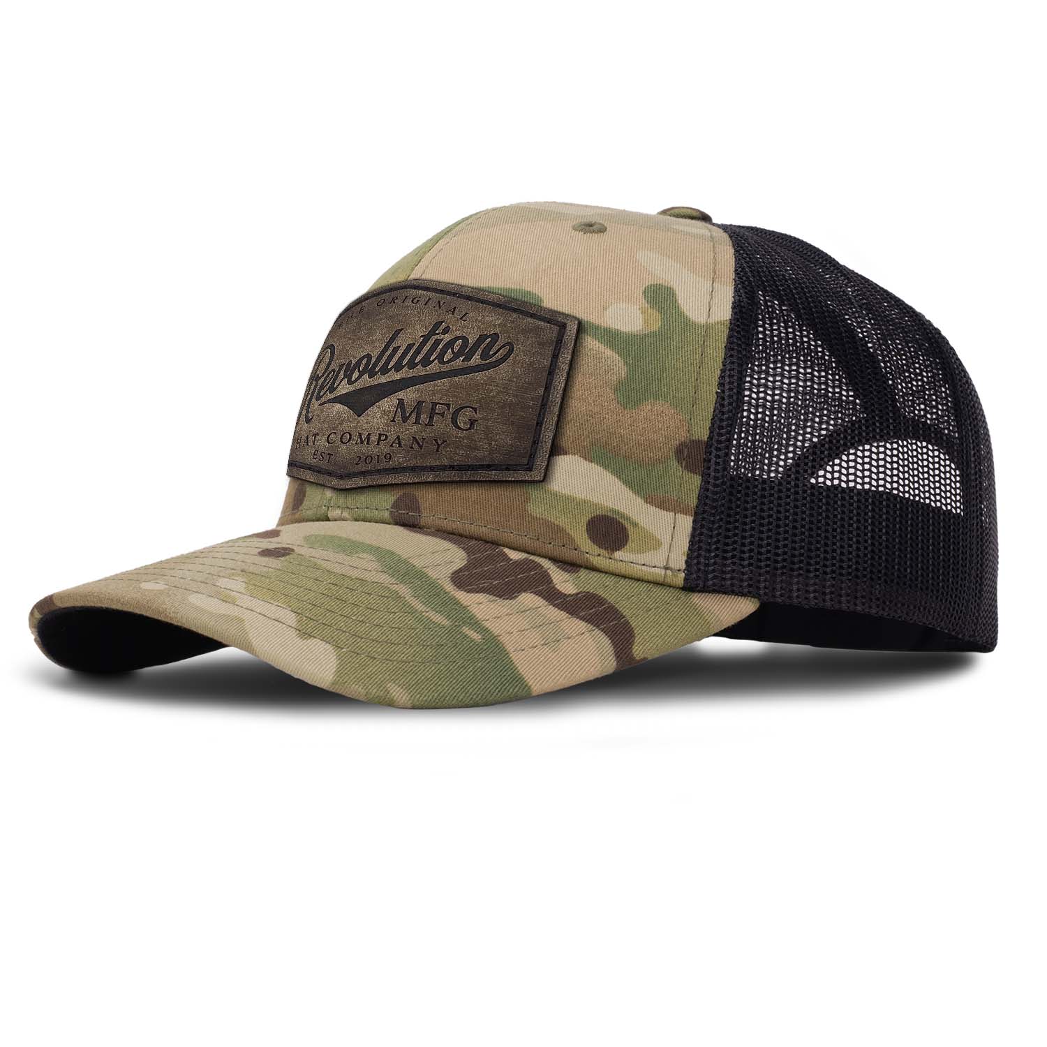 Revolution Hat Co full grain leather patch in a vintage finish on a multicam with black mesh classic trucker hat