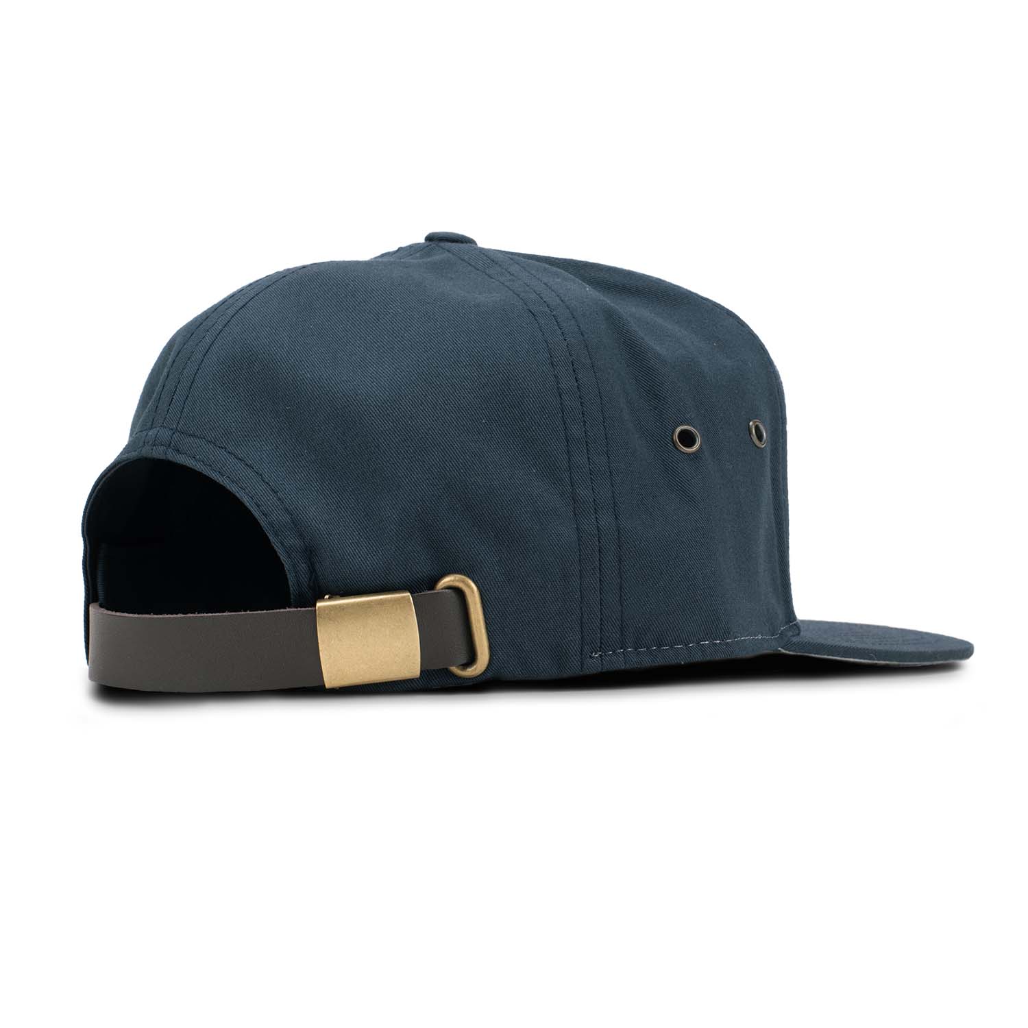 Back view of the pigeon gray and navy 7 panel style hat showing the adjustable leather strapback with brass clasp closure and brass eyelets