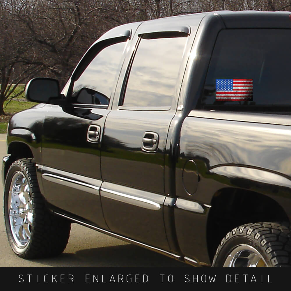American Made Distressed Finish Red White and Blue American Flag Sticker Decal for Car or Truck made from premium vinyl shown on the back window of a black truck