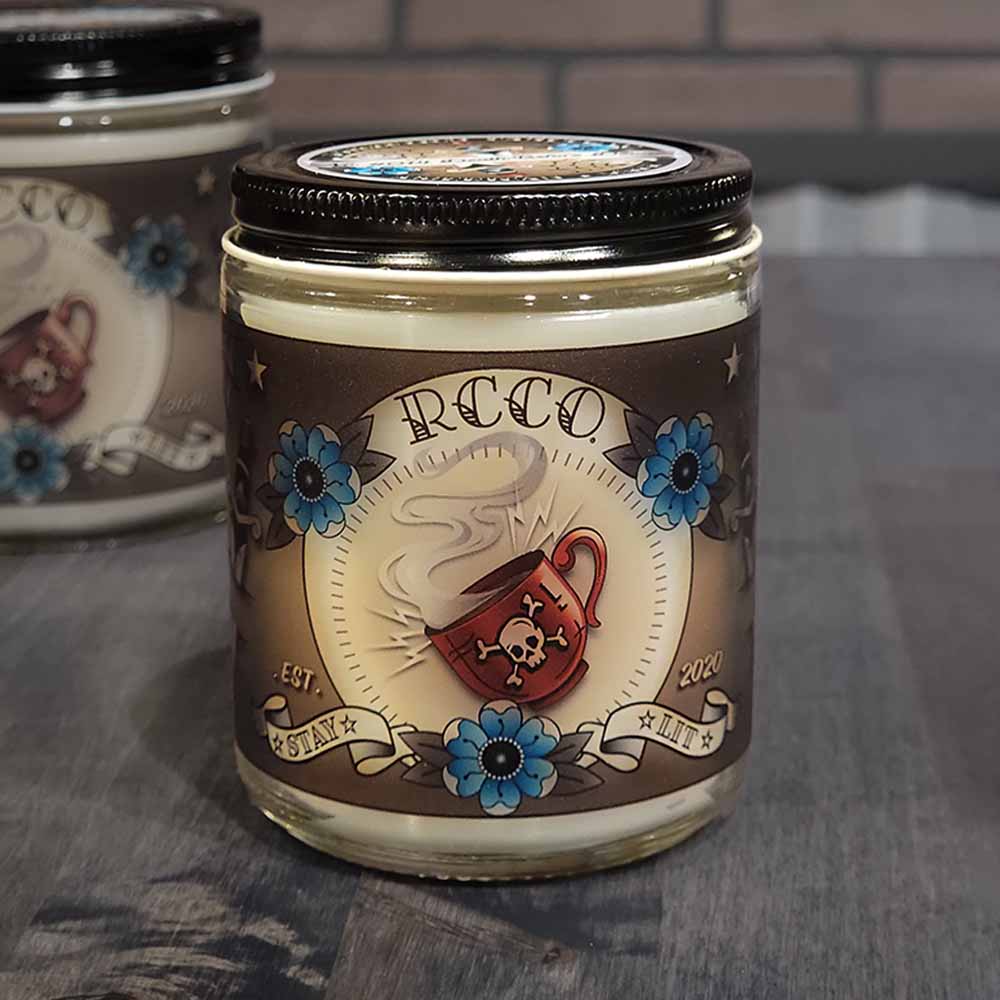 American Made Traditional Tattoo-inspired designs Death Before Decaf Coffee scent Soy blend candle Revolution Candle Co Red Mug with Skull and Crossbones Blue Flowers Old School Daggers