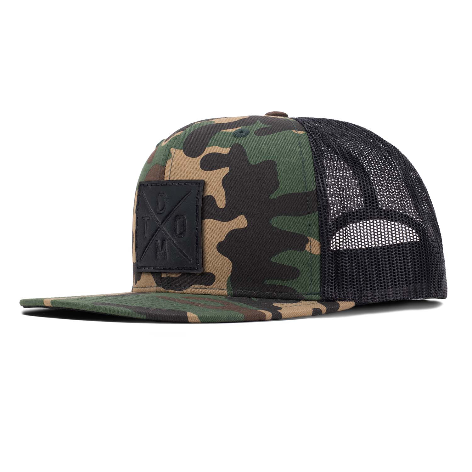 Black full grain leather debossed square DTOM patch on a woodland camo flat bill hat with black mesh