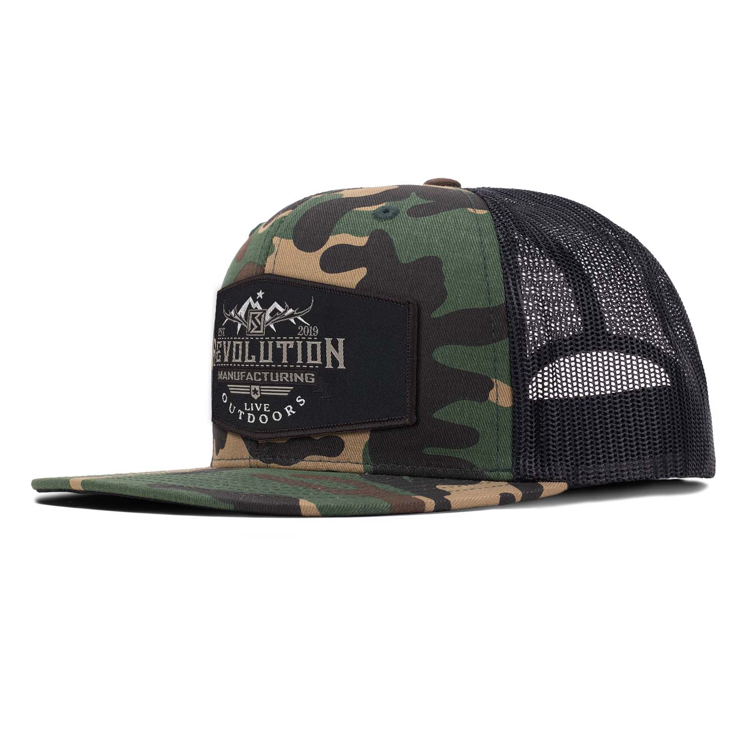 Classic flat bill trucker hat in woodland camo with black mesh with a black with brown border Revolution Mfg Live Outdoors woven patch