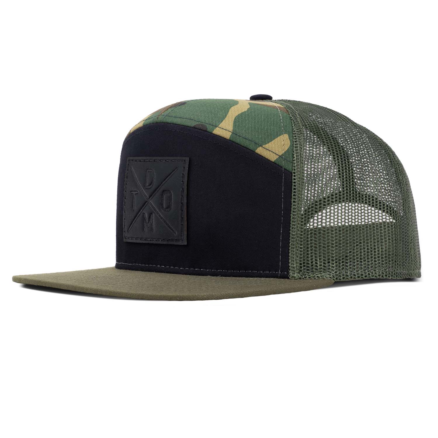 Revolution Mfg woodland camo and black with loden mesh with loden mesh 7 panel trucker featuring our black DTOM debossed full grain leather patch.