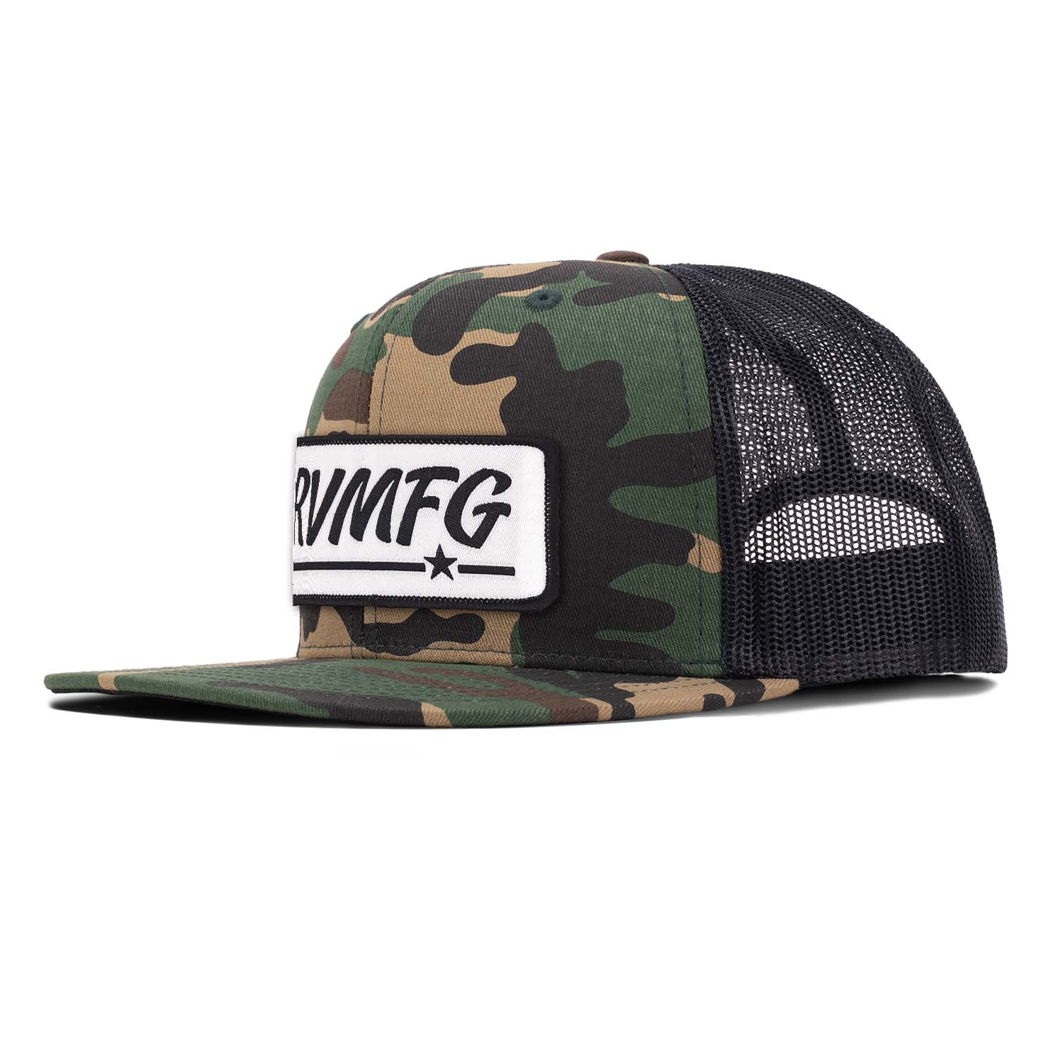 Revolution Mfg flat bill trucker hat in woodland camo with black mesh with a white RVMFG woven patch with black letters and a black border