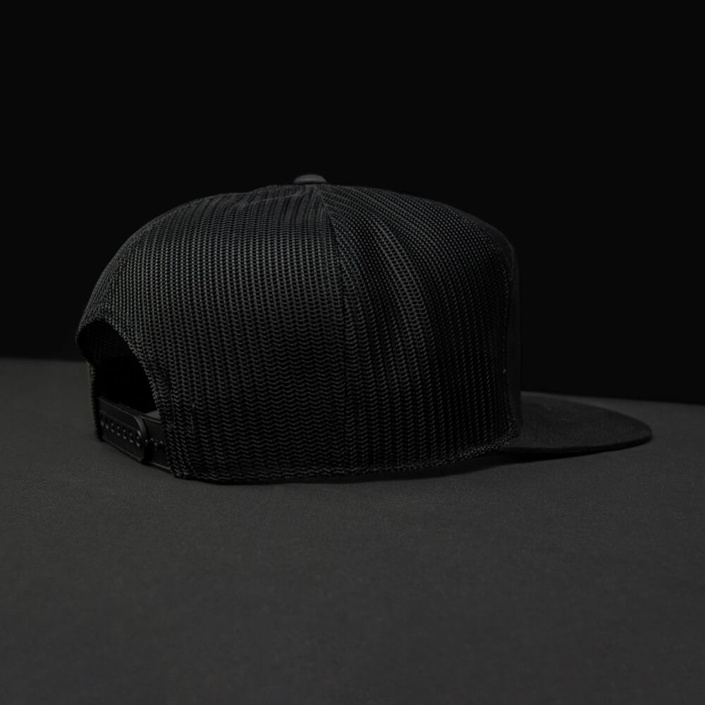 Back view of our black 7 panel snapback trucker hat