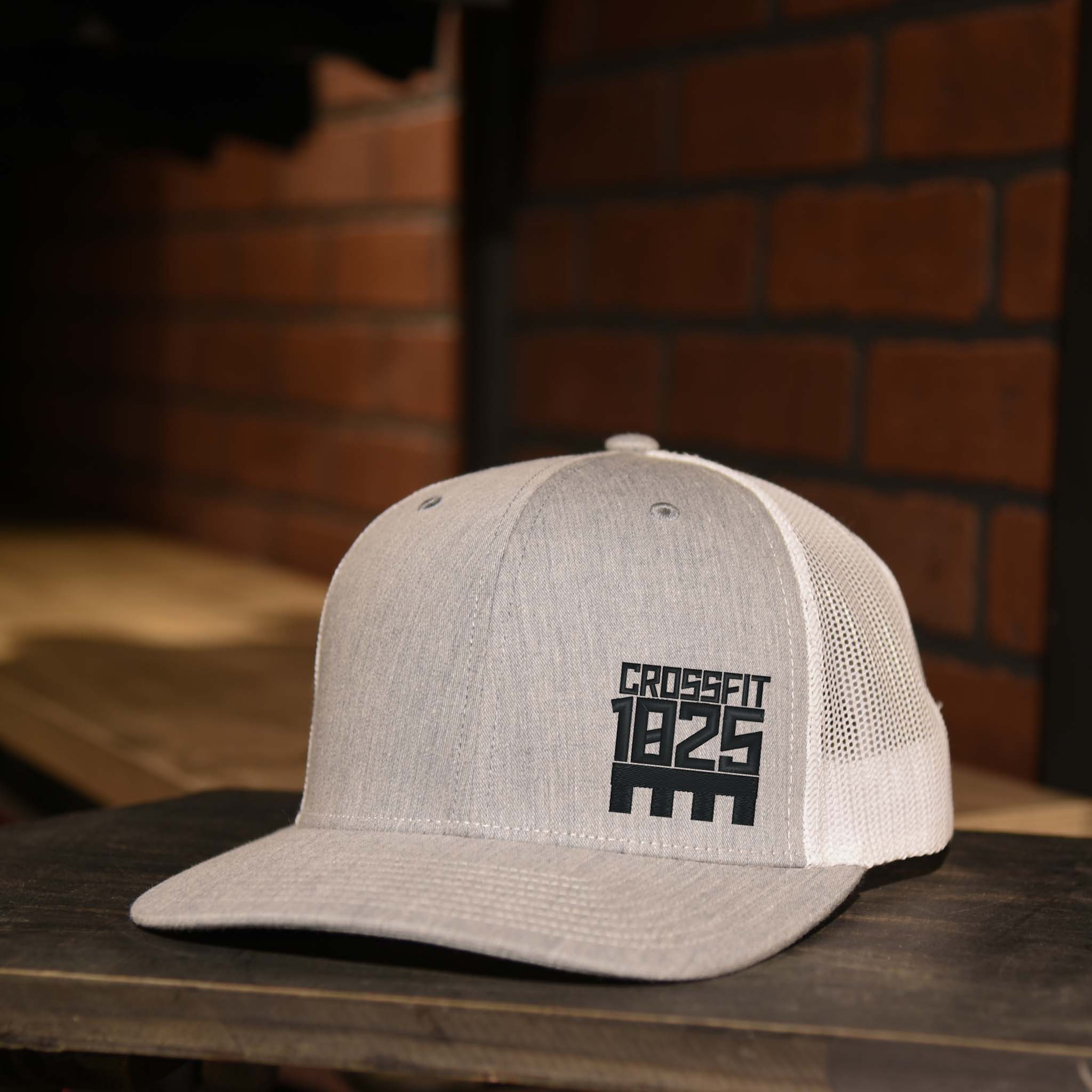 Heather Gray and White Trucker Hat with Crossfit 1825 Logo embroidered in black