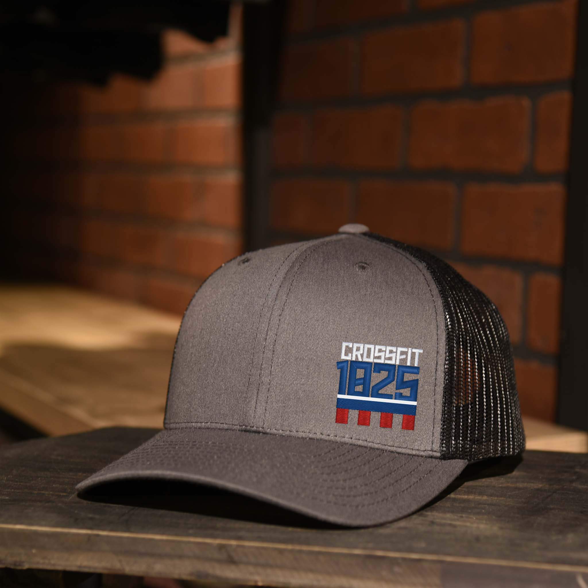 CrossFit 1825 Charcoal & Black Trucker Hat with Red, White, and Blue Embroidered Logo