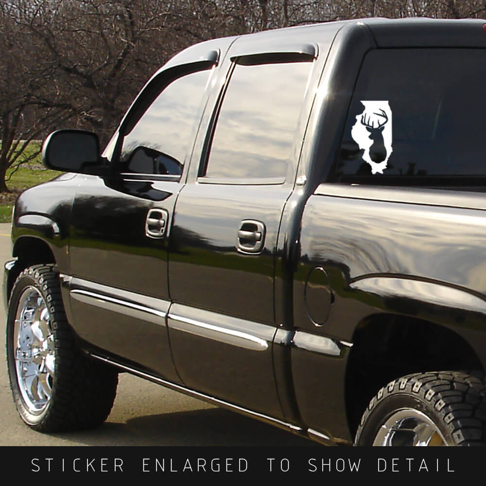 American Made white vinyl Illinois state die cut decal with whitetail deer silhouette cut out shown on back window of black truck