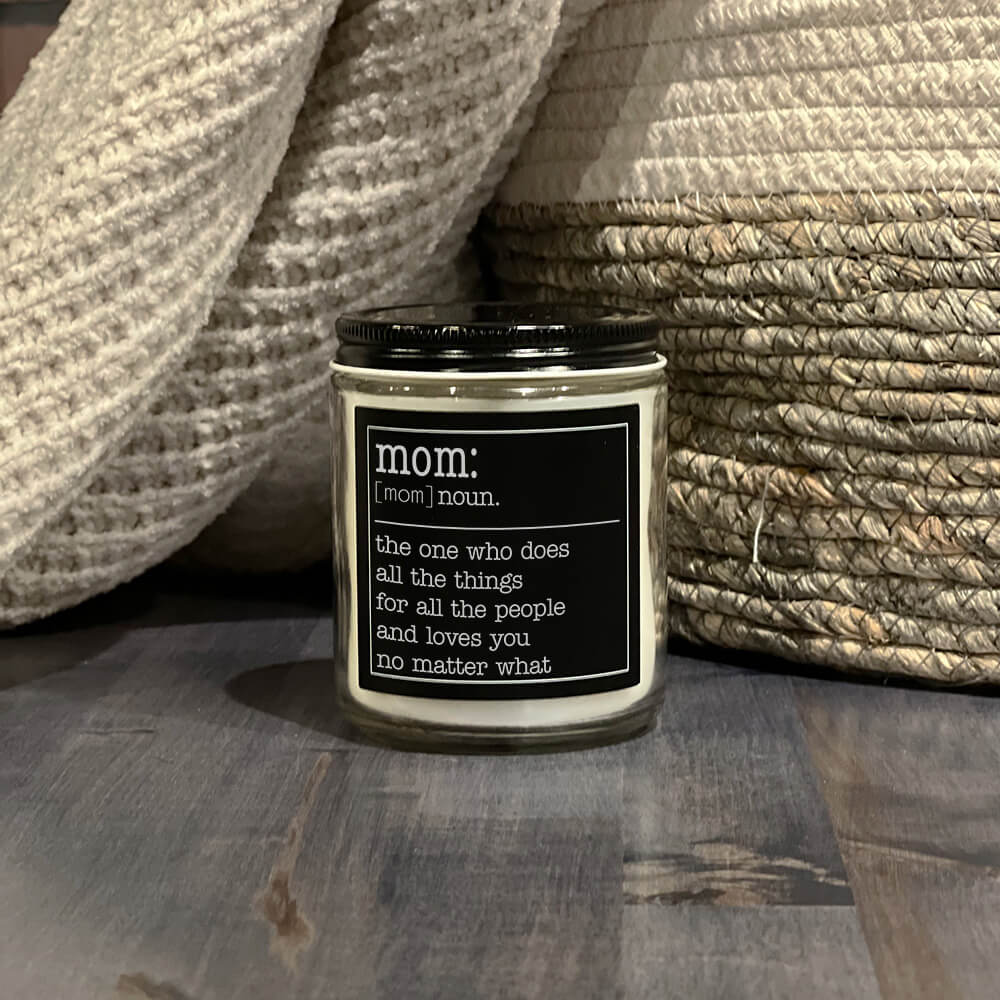 American made mothers day candle definition of mom black label with white text reads mom: the one who does all the things for all the people and loves you no matter what