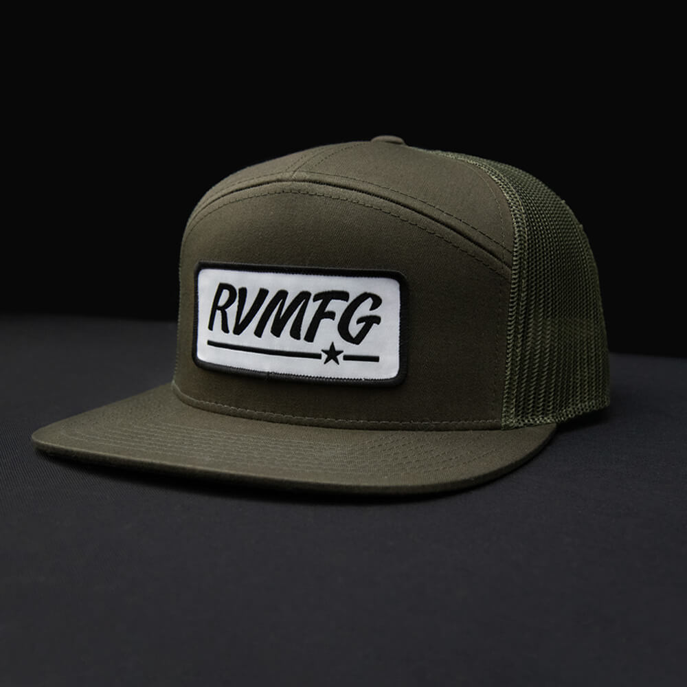RVMFG Loden 7 panel flat bill trucker hat with white woven patch